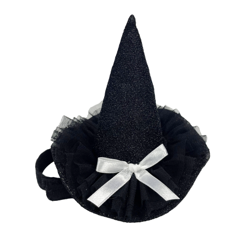 Black witch hat with a white ribbon on a white background