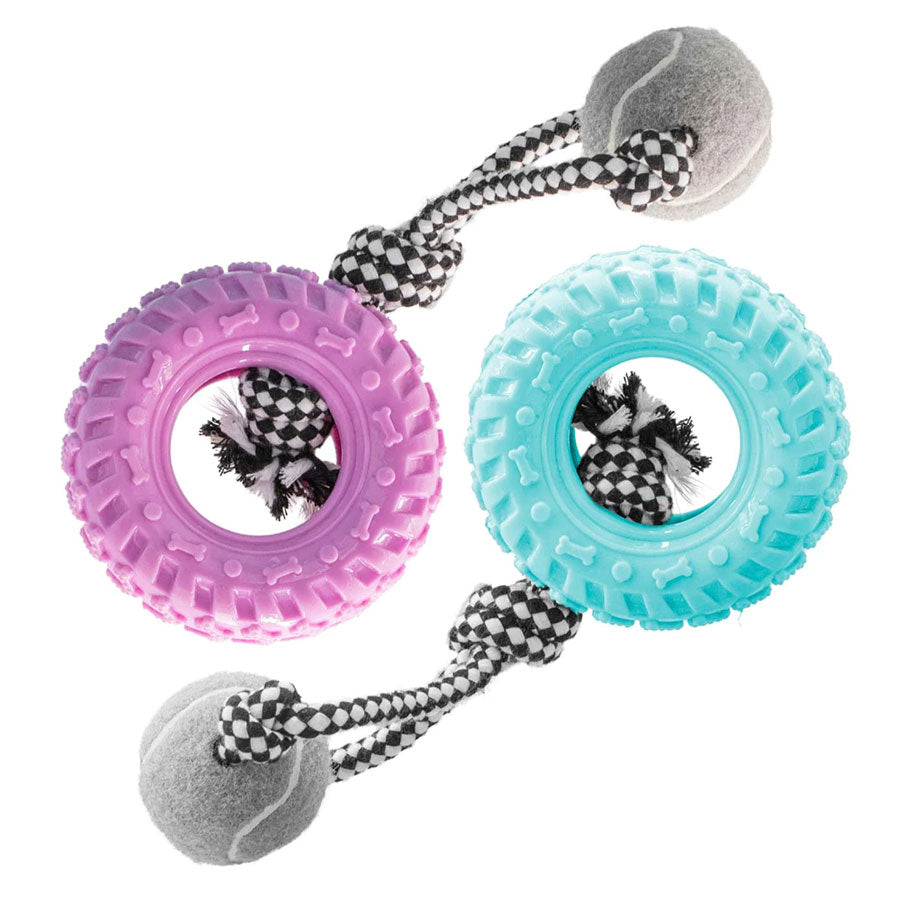 Two dog toys with checkered ropes and tennis balls on a white background