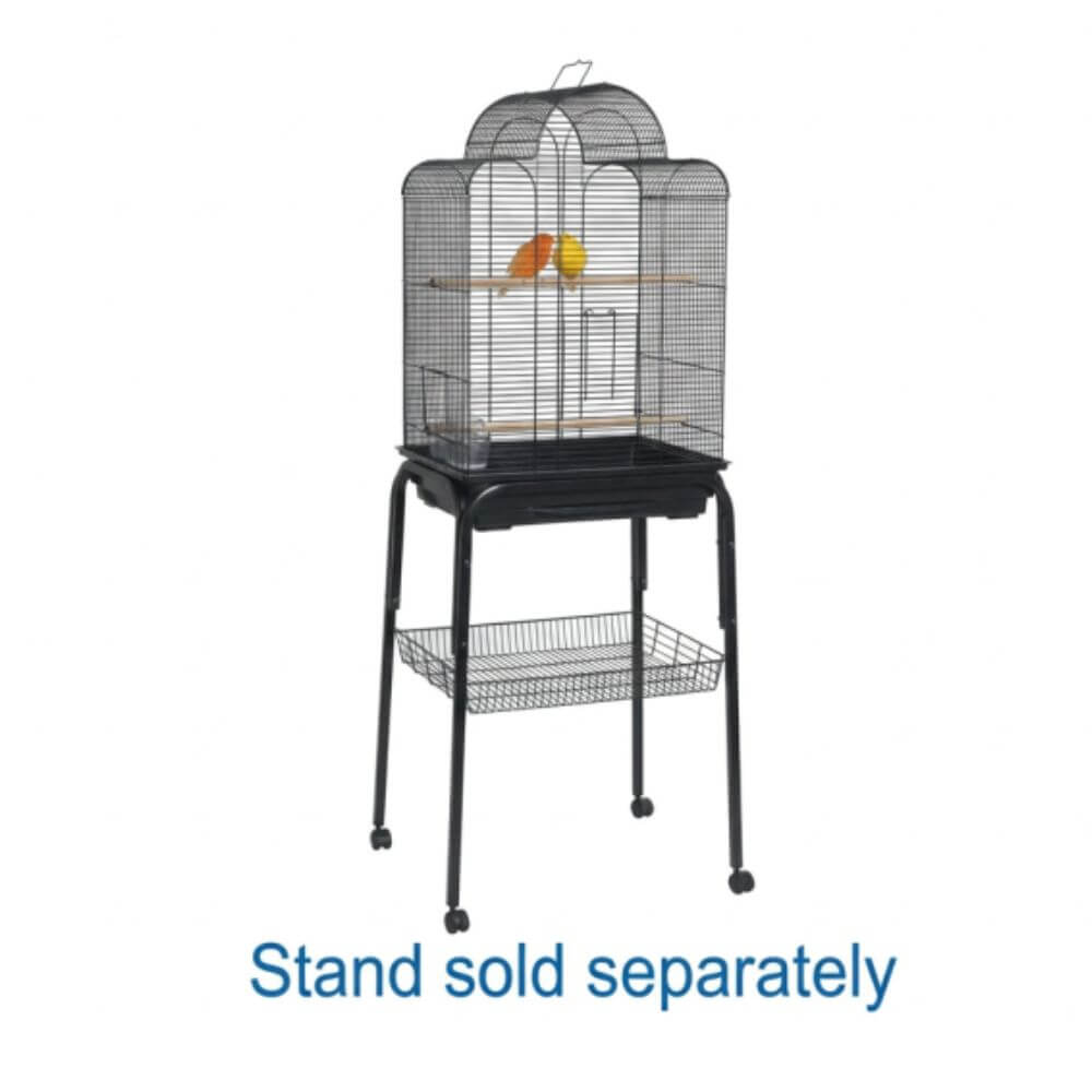A tall black wire bird cage on a matching black stand with a lower shelf, shown against a white background. A small yellow bird is perched inside, and blue text at the bottom reads 'Stand sold separately'.