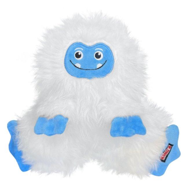 A plush dog toy designed to resemble a white yeti with blue accents, featuring a smiling face and squeakers for texture.