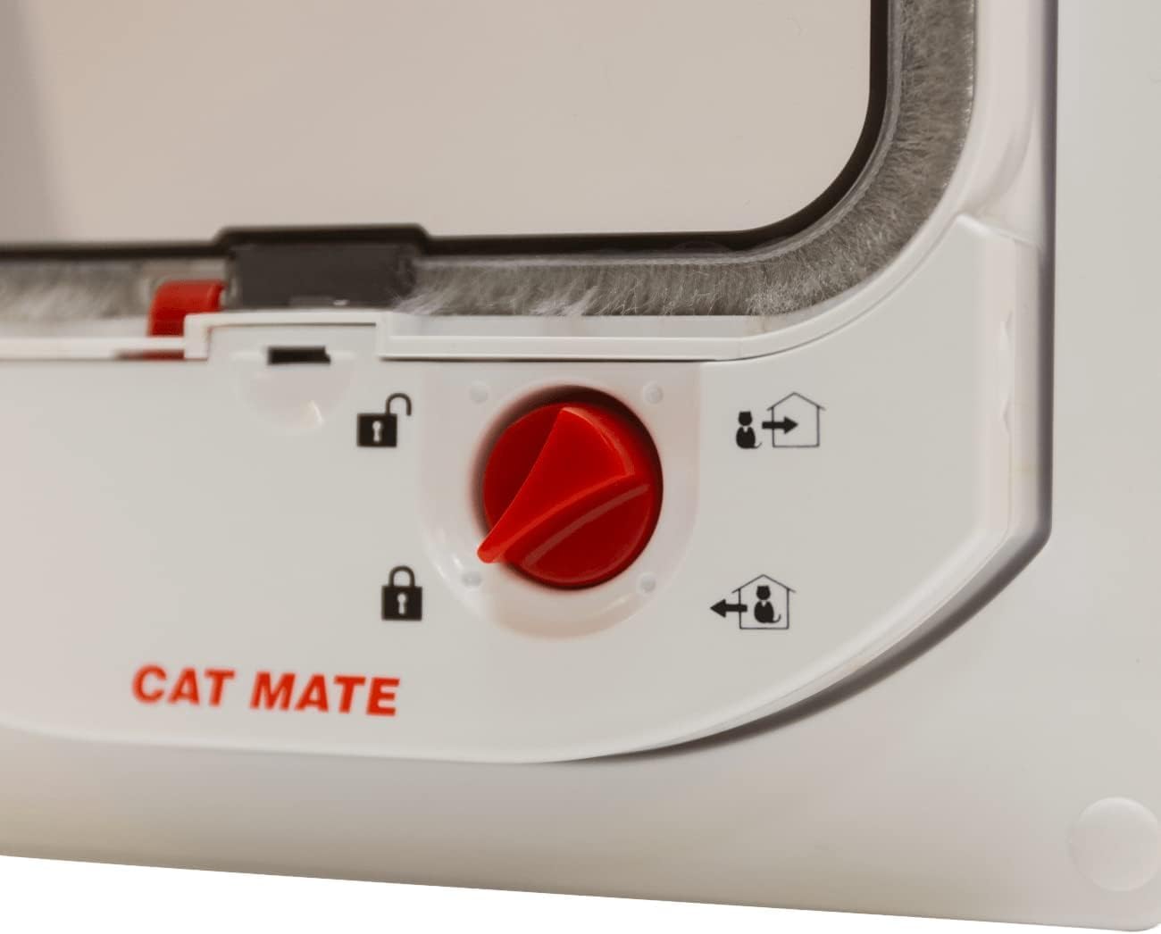 Close-up of a Cat Mate pet product with a red button and white casing.