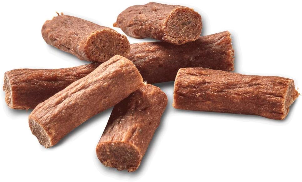 Brown dog treats on a white background