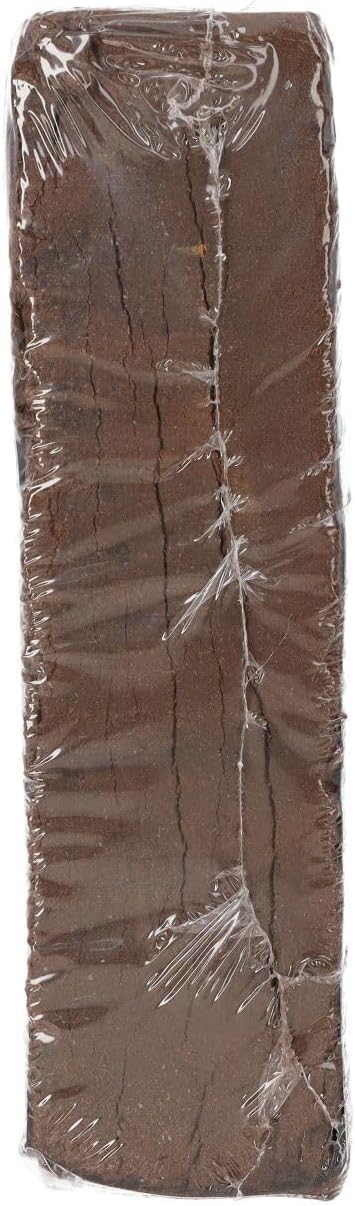 Brown rectangular coco brick wrapped in clear plastic on a white background