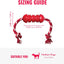 A red dog chew toy with white braided rope handles and tassel ends, shown on a white background with pink measurement lines and text reading 'SIZING GUIDE' and 'Suitable for: Medium Dogs (15 to 35 lbs)'.