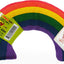 Colorful rainbow-shaped cat toy with tags on a white background