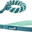 Teal dog leash with a knotted handle on a white background
