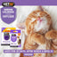 Cat using a VETiQ Serene Calming Diffuser with product packaging displayed.