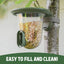 Bird feeder with seeds hanging from a tree, labeled 'Easy to fill and clean'.