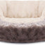 Fluffy pet bed with gray and beige fur on a white background