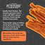 Pet Munchies natural pet treats with chicken strips on a dark background