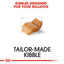 Dog kibble with text 'Kibbles Designed for Your Bulldog' and 'Tailor-Made Kibble' on a white background.