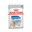 Royal Canin Light Weight Care dog food pouch on a white background