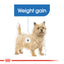 Dog with weight gain measurement chart on a white background, featuring a blue banner and red brand logo.