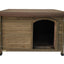 Wooden dog house with a brown roof on a white background