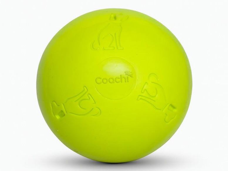 A bright lime green Coachi dog toy ball with embossed dog icons and the Coachi brand name in the center, shown on a clean white background.
