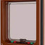 A brown cat flap with a 4 way locking mechanism.