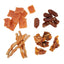 Assorted dried meat and dog treats on a white background