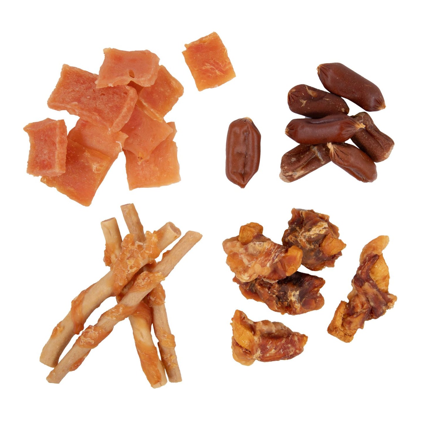 Assorted dried meat and dog treats on a white background