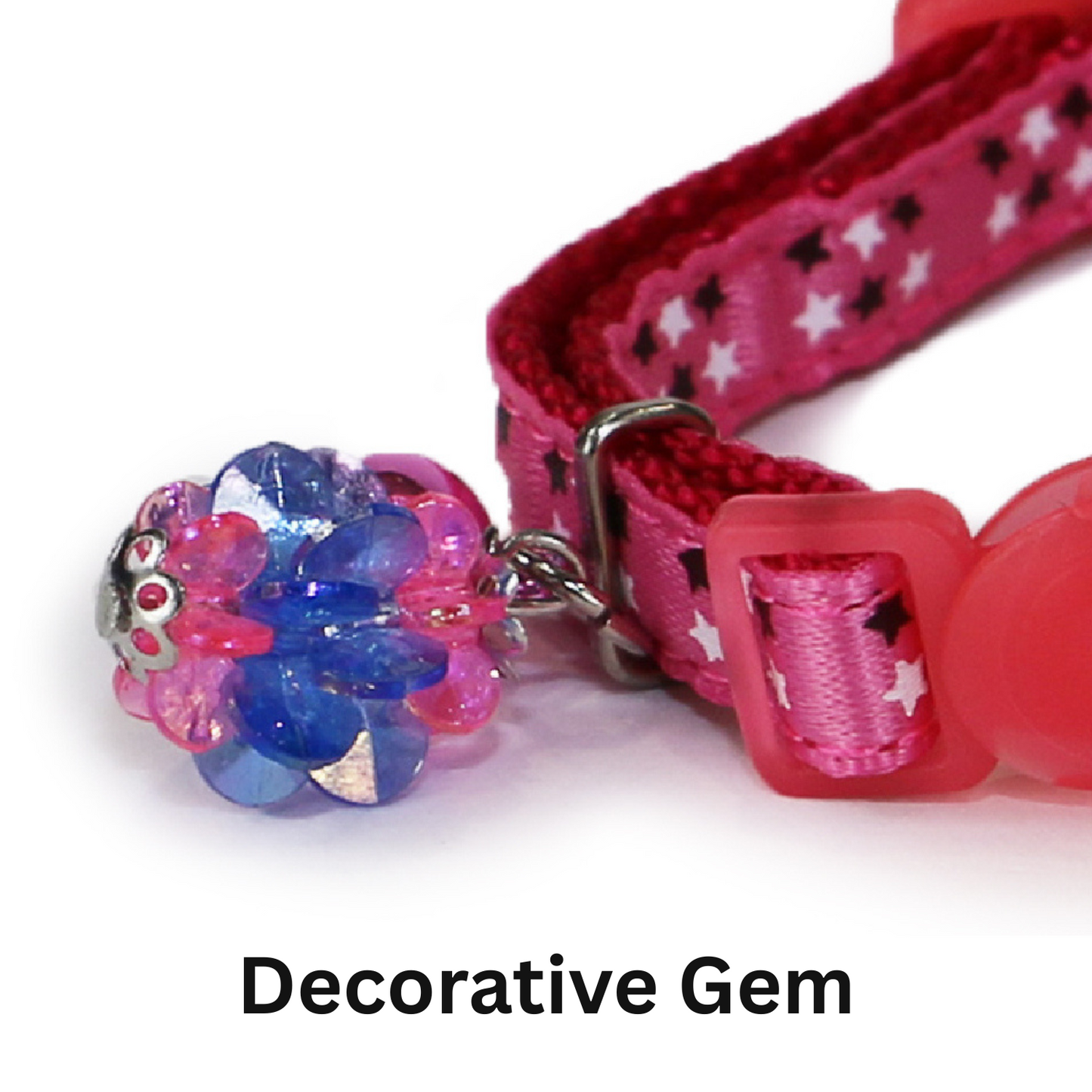 Pink cat collar with decorative gem and star pattern on a white background