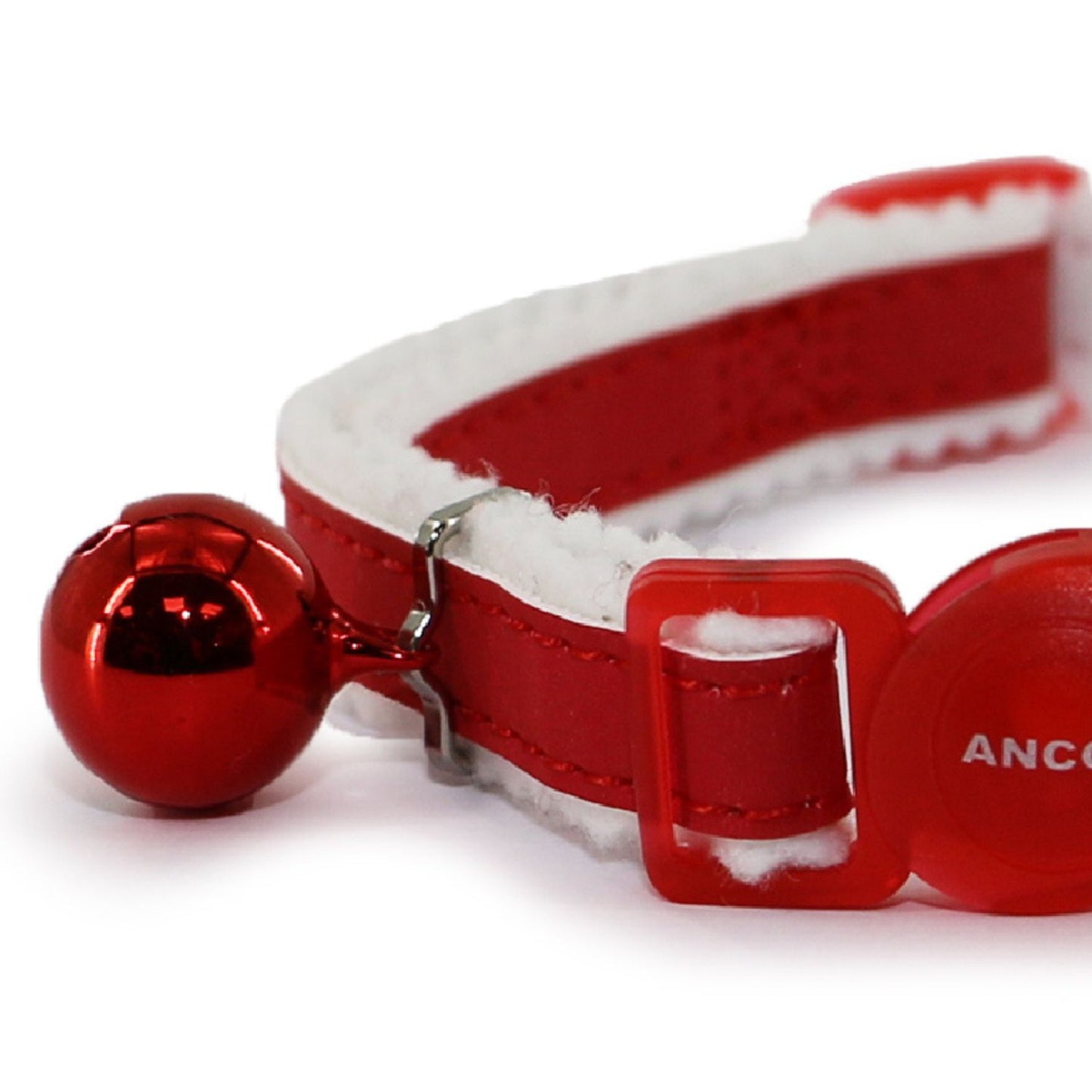 Red cat collar with a bell on a white background