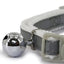 Close-up of a gray cat collar with a silver bell on a white background