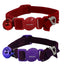 Red and purple cat collars with bells and heart-shaped buckles on a white background
