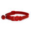 Red cat collar with a bell on a white background