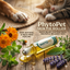 PhytoPet Skin Fix Roller bottle with natural ingredients on a wooden surface