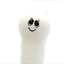 White ghost dog toy with a smiley face design on a white background