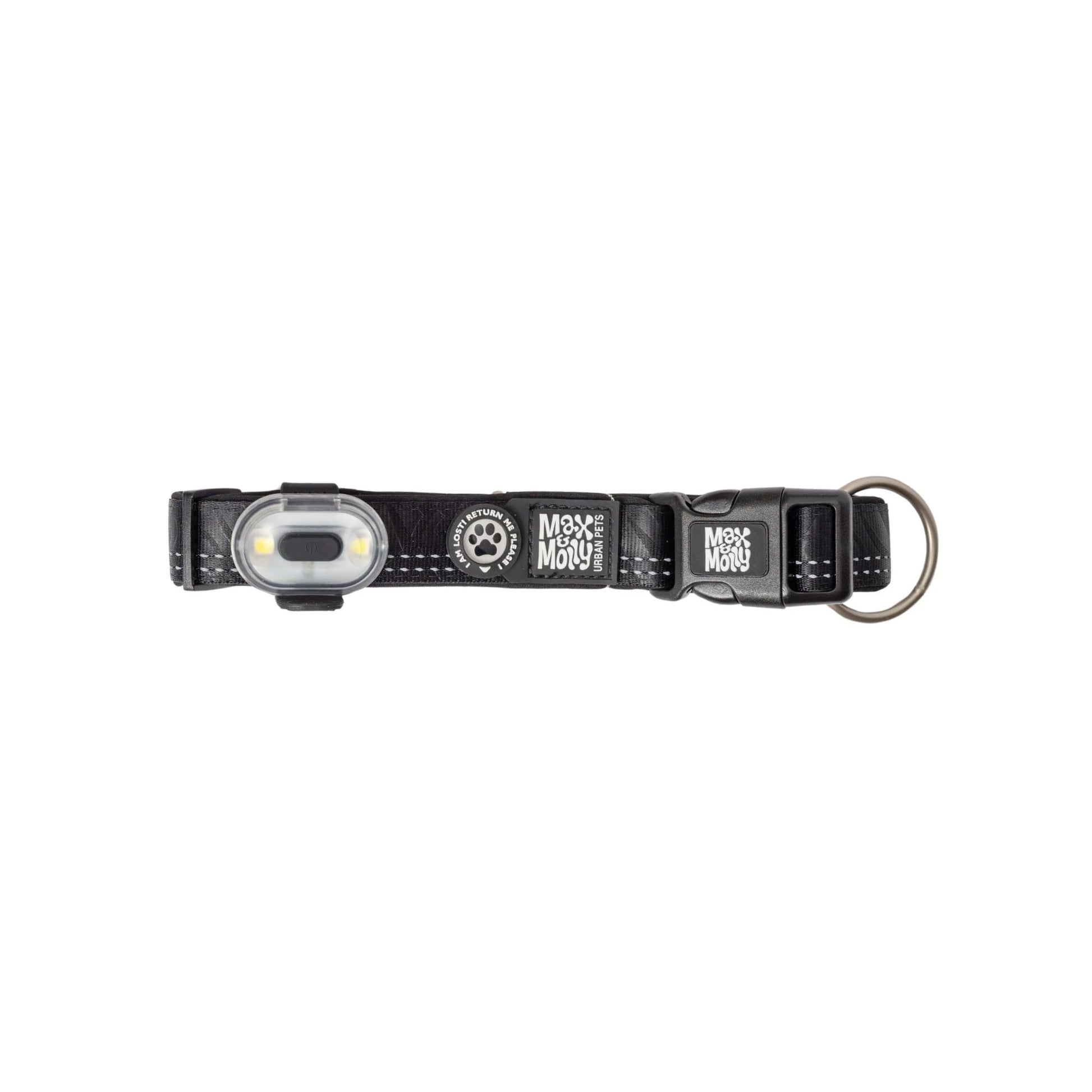 Black dog collar with a light on a white background