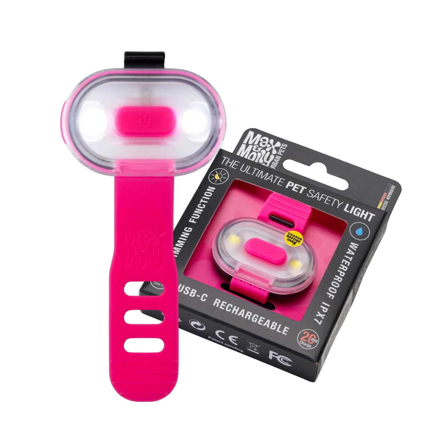 Pink pet safety light with packaging on a white background