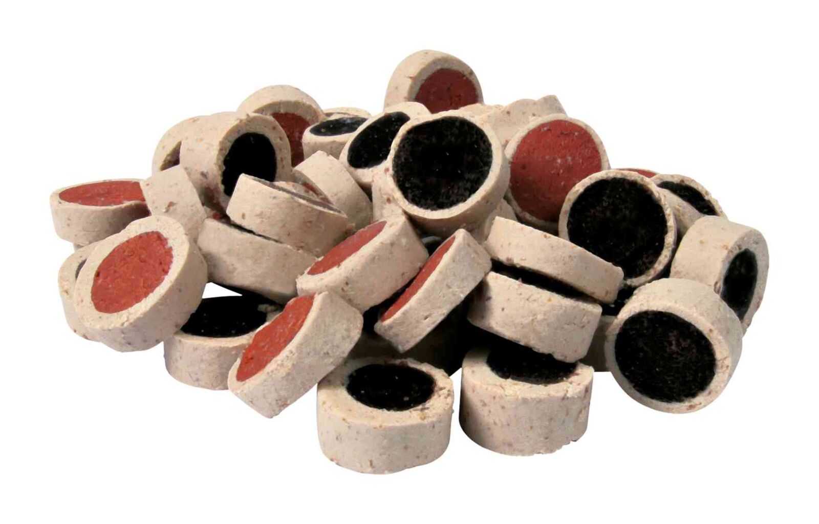 Collection of round, dog treats  with red and black centers on a white background