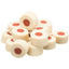 Stack of round cat treats with red centers on a white background