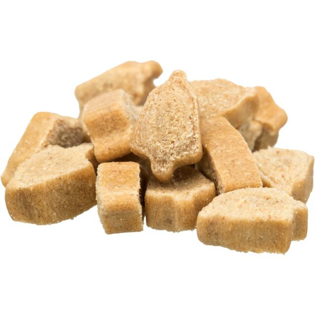 Pile of brown cat treats on a white background