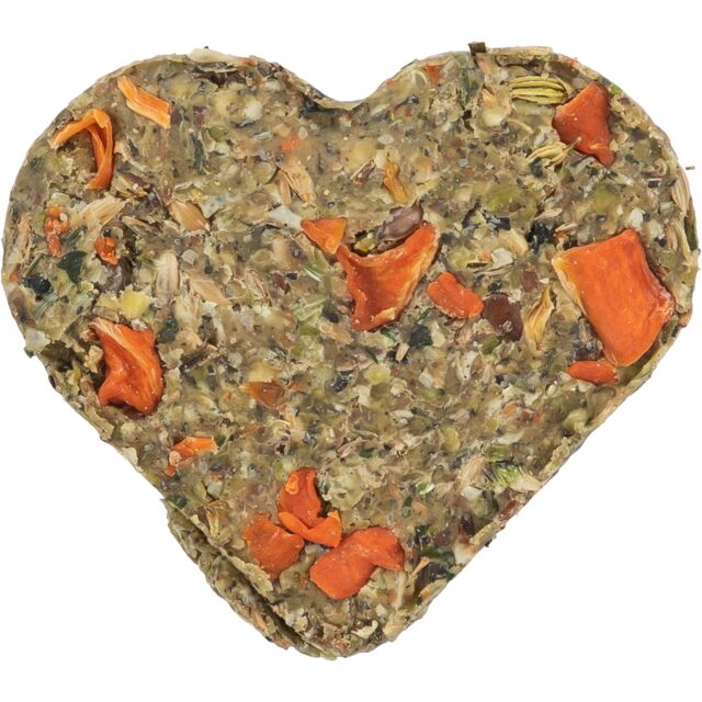 Heart-shaped pet treat with various ingredients on a white background
