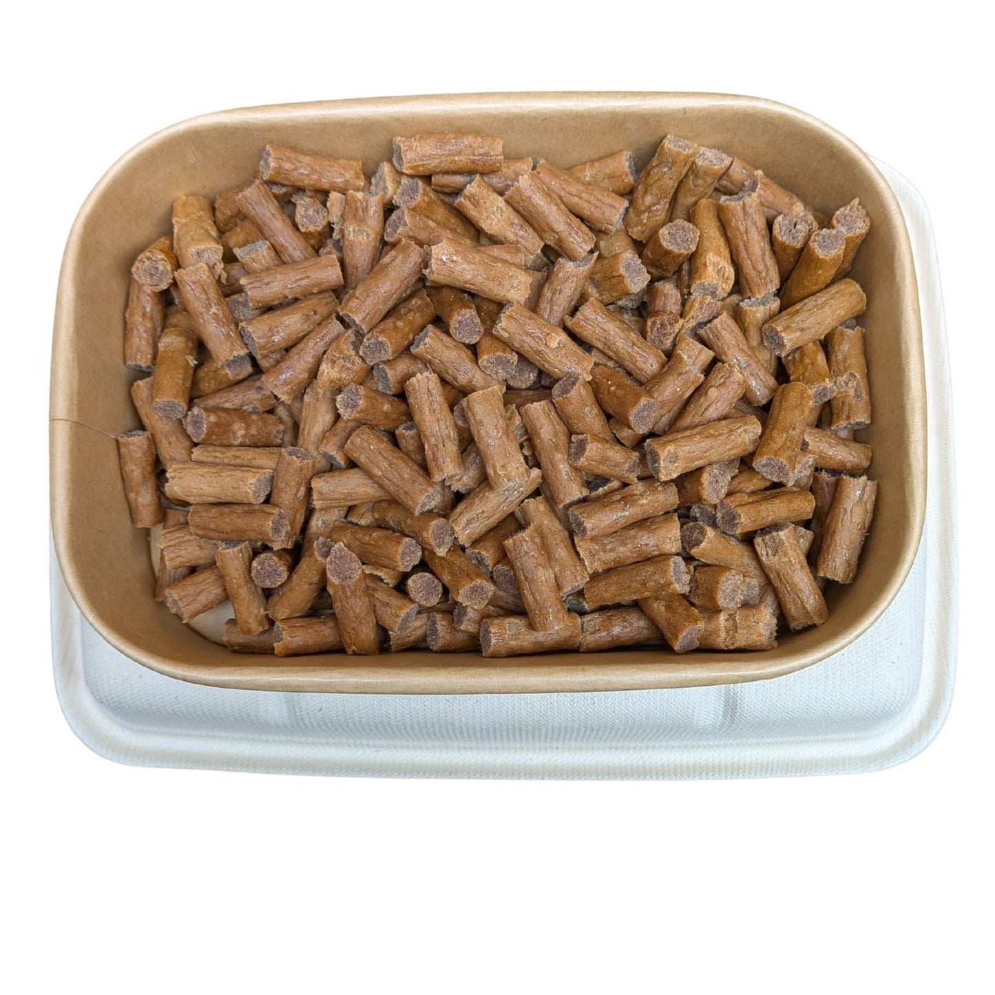 Container of brown cylindrical dog treats on a white background
