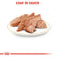 Dog food loaf in sauce on a white plate with red text and logo.