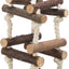 Wooden bird perch with rope and metal hook on a white background