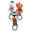 Three Christmas-themed dog toys in the shape of a snowman, reindeer, and penguin, each with a festive scarf and hat, and a green rope for pulling.