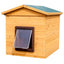 A wooden dog kennel with a flatpack design, featuring a brown color and a plastic flap for dog entry and exit. The roof is green and the kennel has a solid construction.