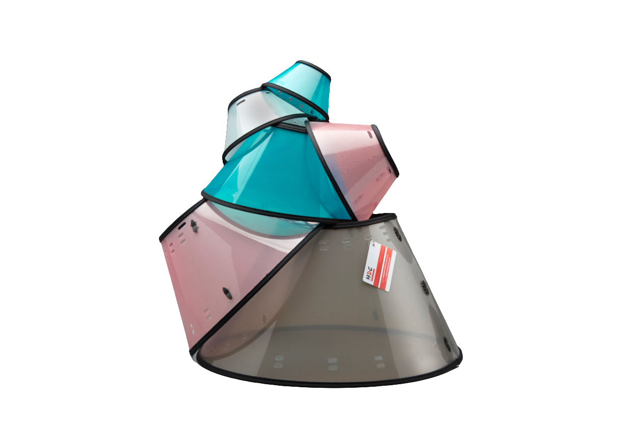 A stack of translucent plastic pet medical collars in teal green, pink, and smoky grey, designed for dogs and cats during recovery from surgery.