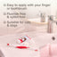 Cat and dog toothpaste with a toothbrush on a bathroom counter, featuring text about its use.
