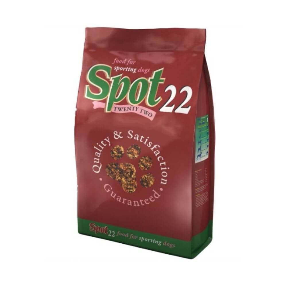 A bag of Spot 22 food for sporting dogs dog food, 20kg, featuring a dark red bag with green and white branding and a green base, shown on a plain white background.