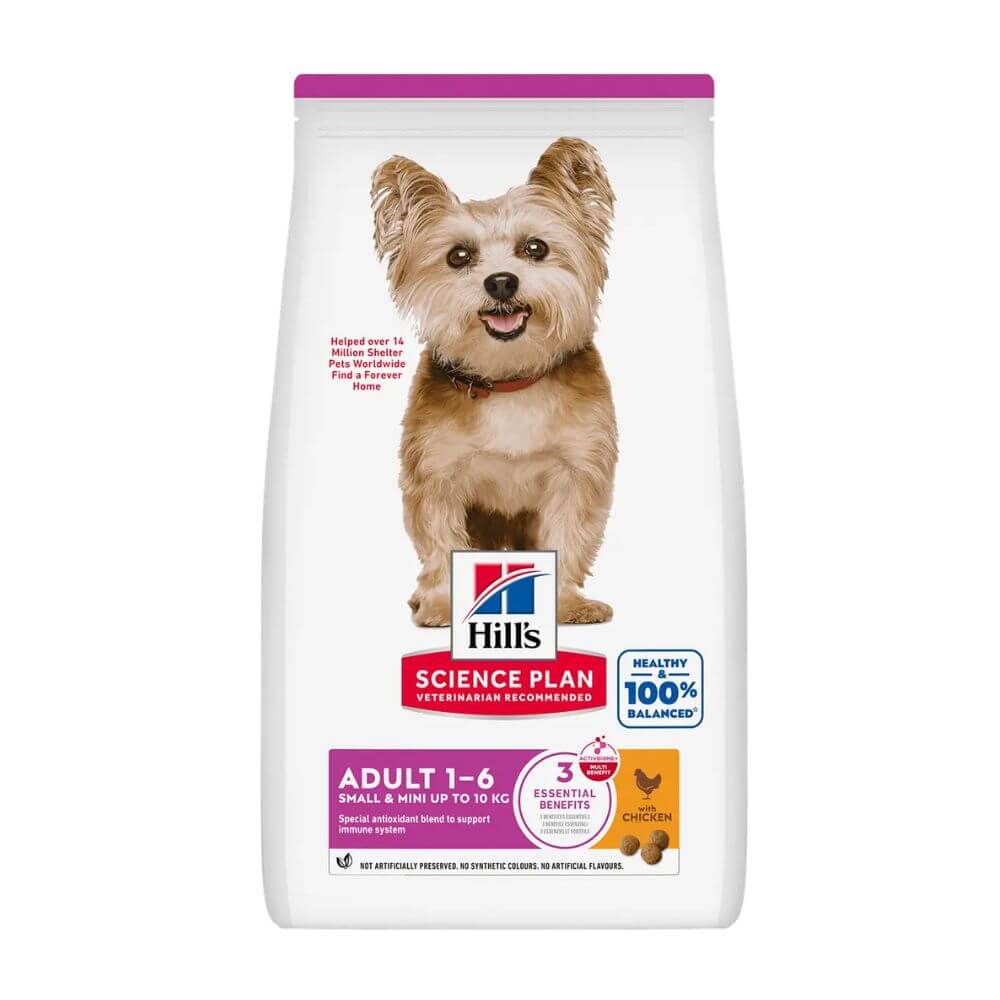 A bag of Hill's Science Plan Adult 1-6 dog food, featuring a small tan dog on the front of a white bag with purple and red accents. Dry dog food for small and mini dogs. 