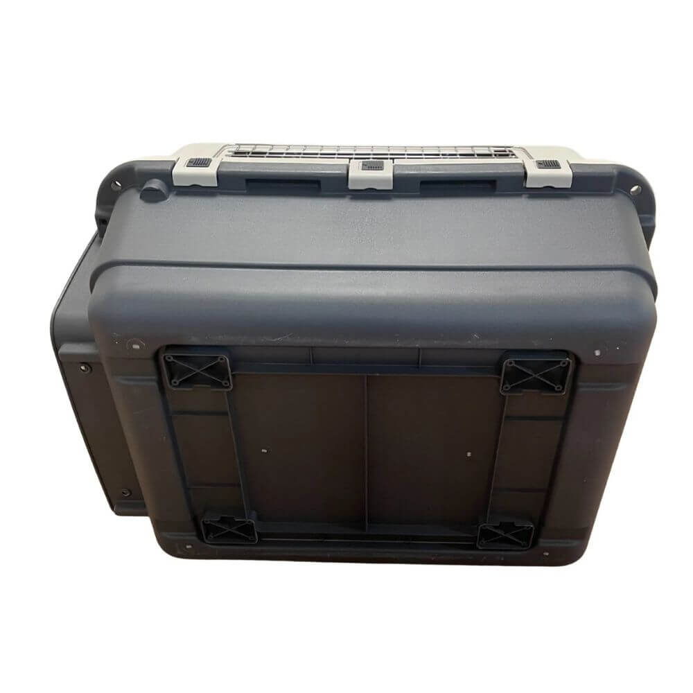 A pet aviation carrier crate with a light gray top and dark gray base, featuring metal wire ventilation grates and a front door. Suitable for dogs and cats.