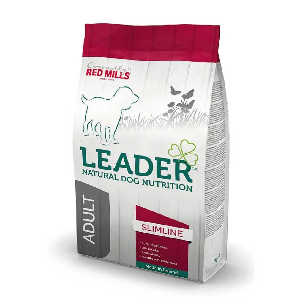 A bag of Leader Natural Dog Nutrition Slimline Adult dog food by Red Mill's, featuring a white bag with a dark red top, green and red text, and a gray vertical 'ADULT' label.