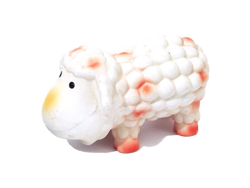 White sheep dog toy with pinkish-red accents on a white background