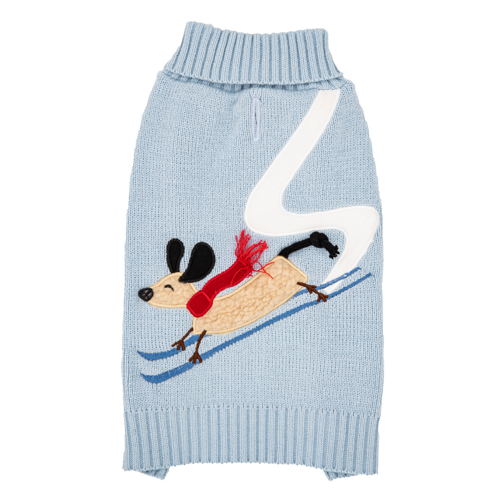 Light blue knitted dog sweater with a dog skiing design on a white background