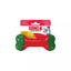 Red and green KONG Core Strength dog toy with packaging on a white background