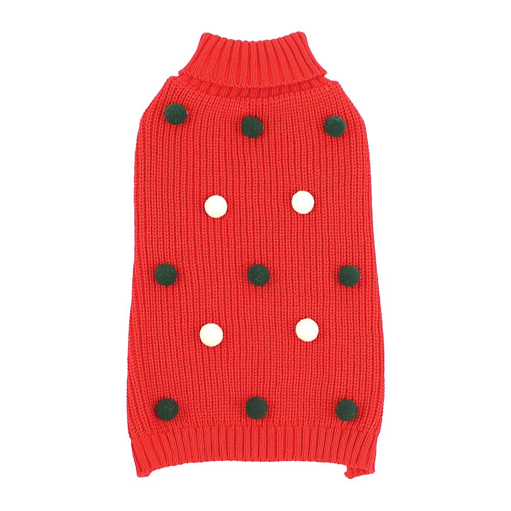 Red dog sweater with black and white polka dot pattern on a white background